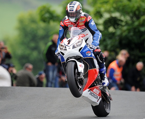 John McGuinness on his way to victory in the Dainese Superbike TT at the 2012 Isle of Man TT